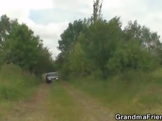 Granny is picked up and fucked in the fields